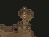 A screenshot of cave with light shining in from above.